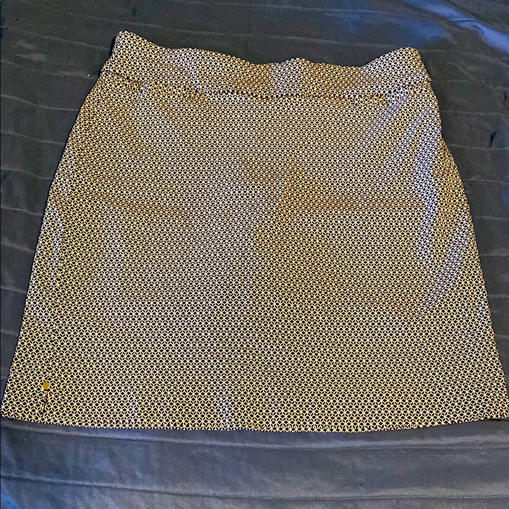 Kim Rogers size 10 Skort, Navy blue with white design. Matching shorts attached.